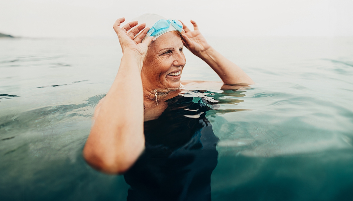 Cancer Care senior woman swimming hero