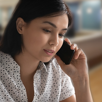 young asian woman on phone